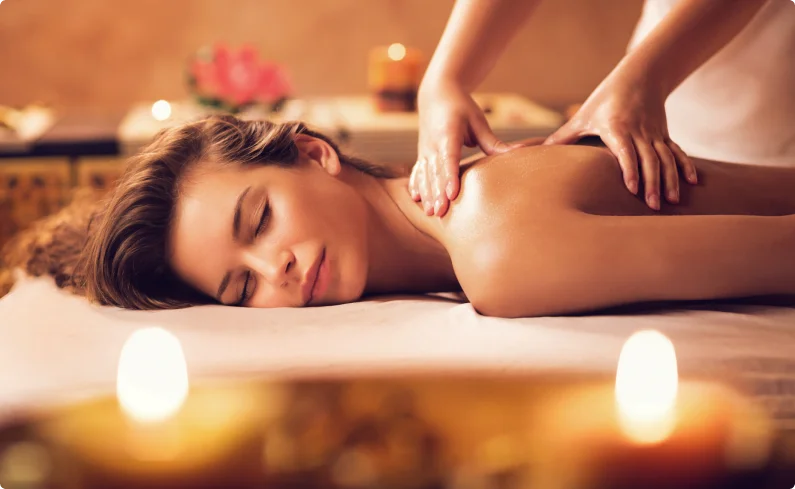 Woman enjoying a spa massage.