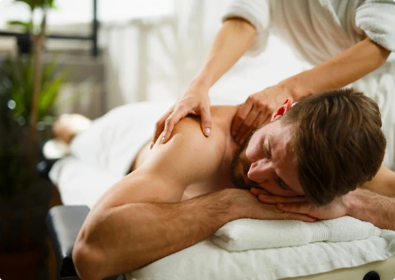 Man receiving shoulder massage.